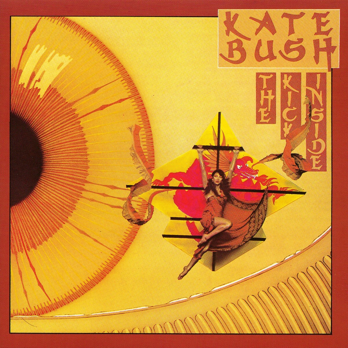 The album cover. On the top right, the name “Kate Bush” and the title “The Kick Inside” are written using a font that reminds of Chinese calligraphy. On the left, the right half on an eyebulb. At the center, Kate Bush held to a cross-like (or maybe main mast-like?) thing and wearing a red dress. Most of the cover is yellow, but the external “frame” contour is red.